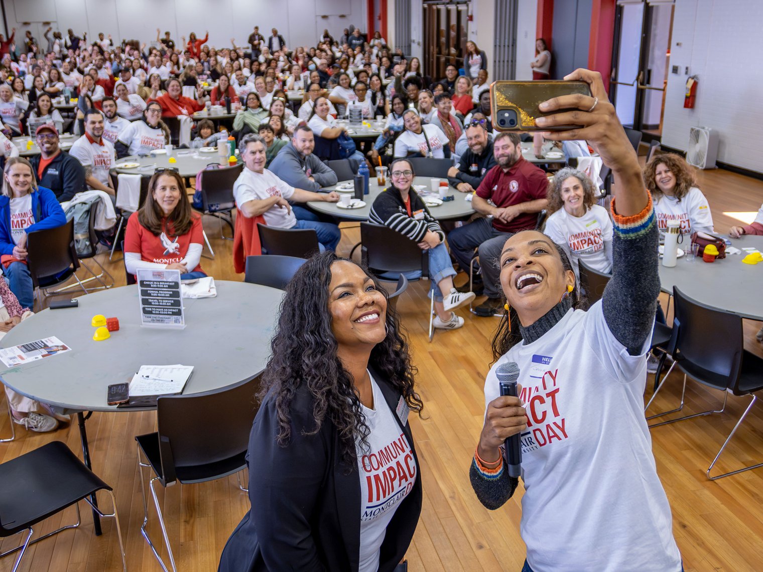 Jayme Ganey takes a selfie with Associate Vice President for Inclusive Excellence and Special Assistant to the President Ashante Connor and the hundreds of volunteers.