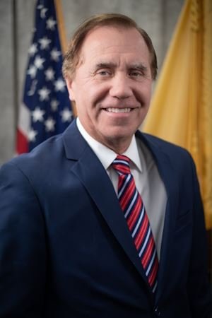 headshot of Assembly Speaker Craig Coughlin