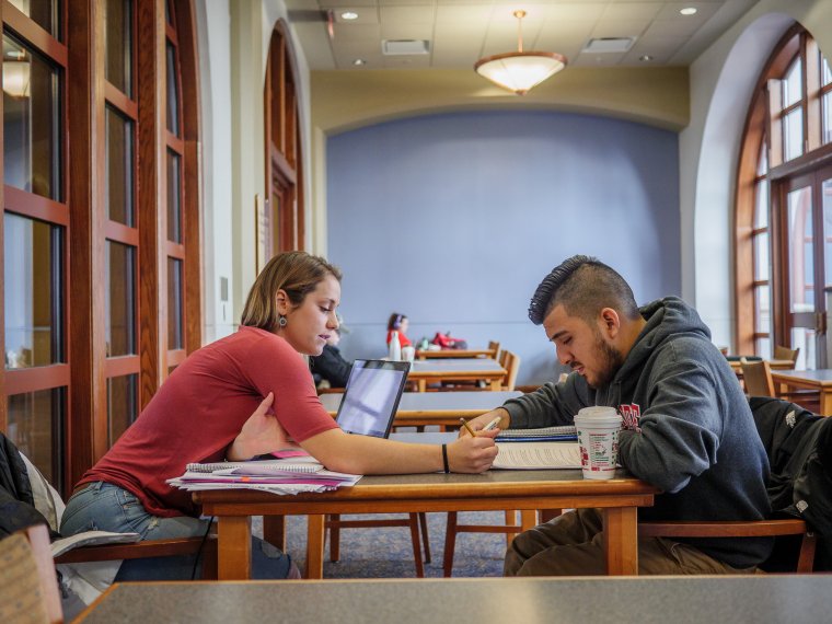two students study in University Hall