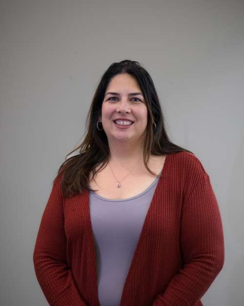 Headshot of Jessica Pichardo in red sweater