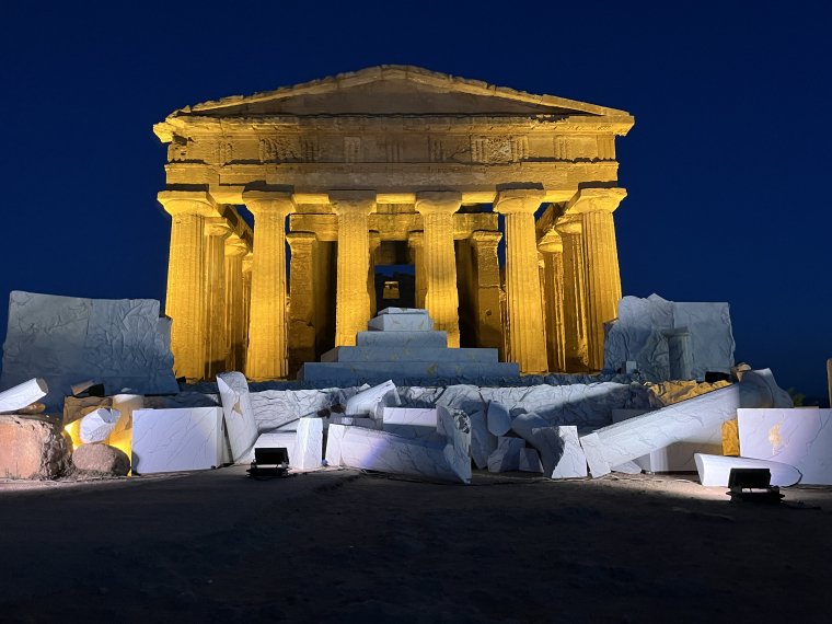 A Greek temple with fake marble set pieces - night