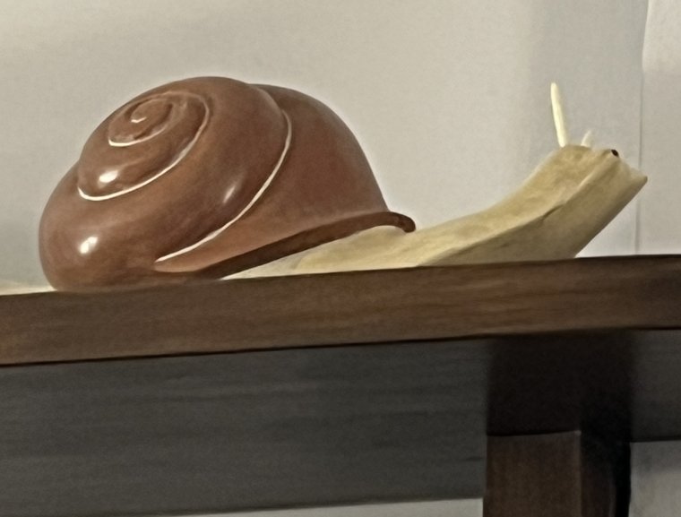 A ceramic snail